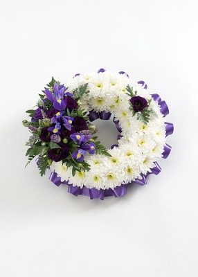 Traditional Wreath Based White with Purple Spray